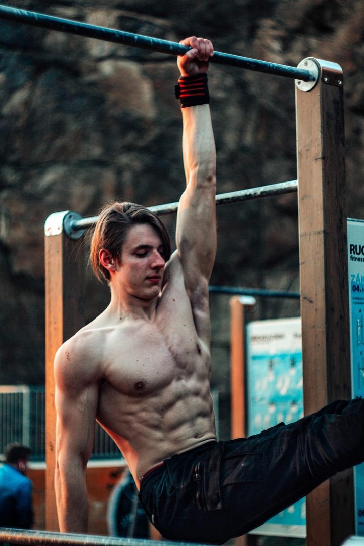 Man lifting weights in gym
